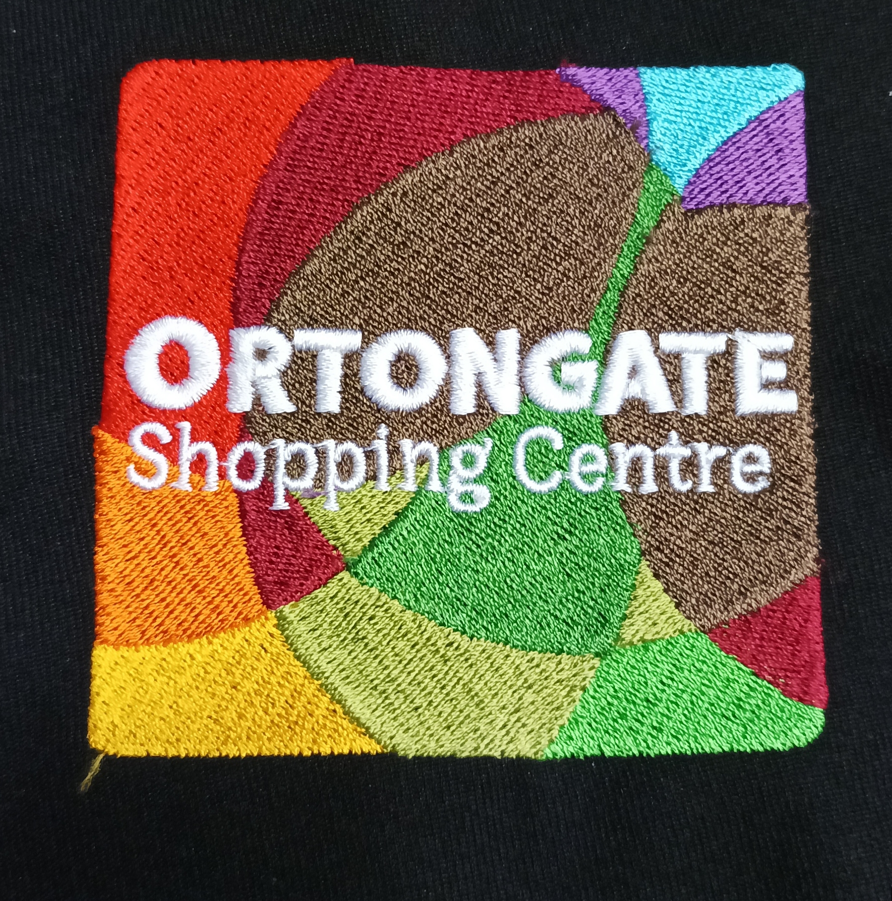 Embroidered logo for the Ortongate Shopping Centre